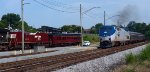 Amtrak tr. 66 passes the NS research and test train tied up for the weekend in Lynchburg.